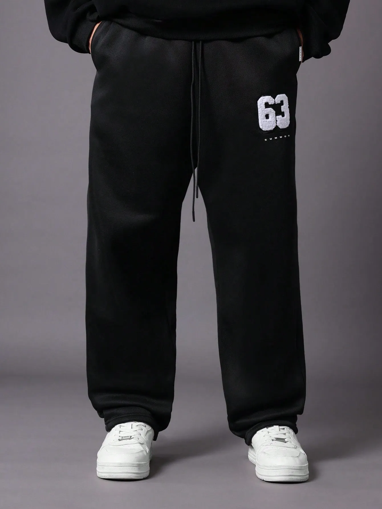 Drop Crotch Sweatpants With Drawstrings & Applique Embroidery Pattern